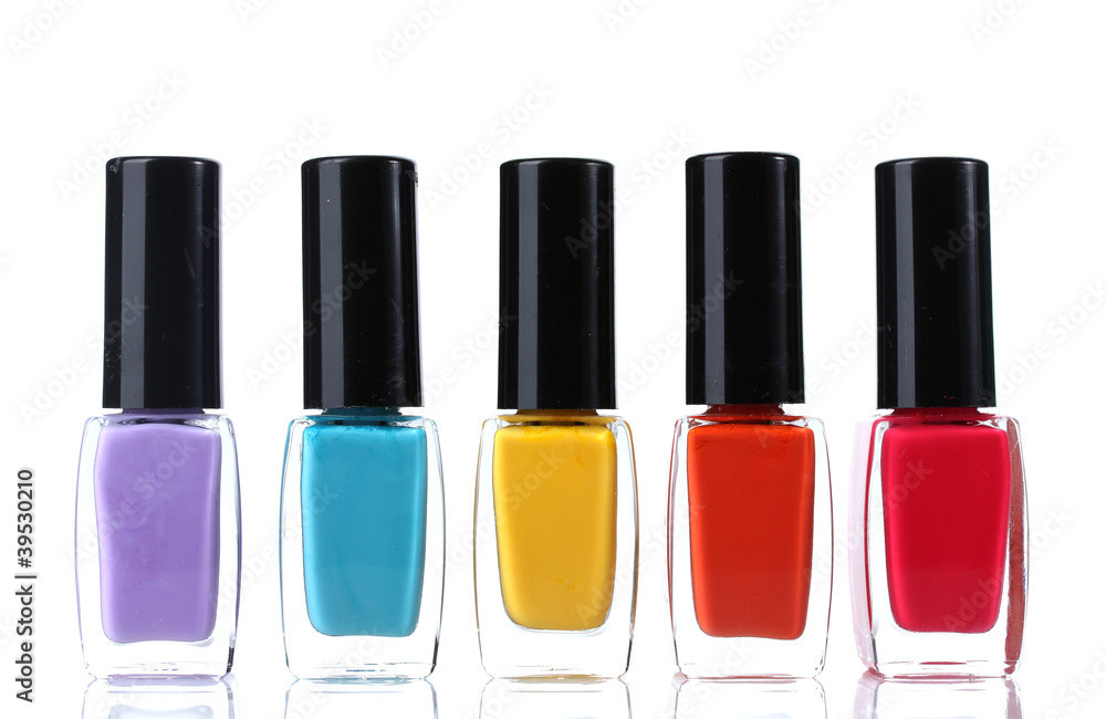 Group of bright nail polishes isolated on white Group of bright nail polishes isolated on white
