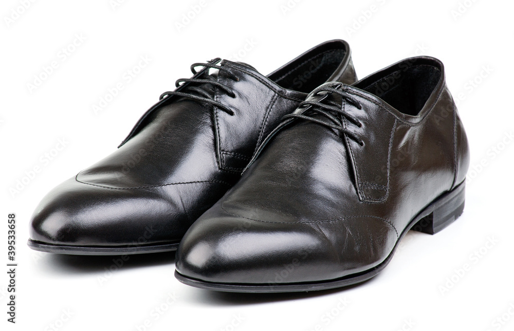 Pair of black male classic shoes over white Pair of black male classic shoes over white