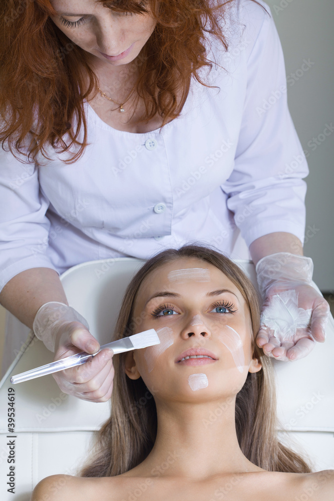 Beautiful woman with facial mask at beauty salon Beautiful woman with facial mask at beauty salon