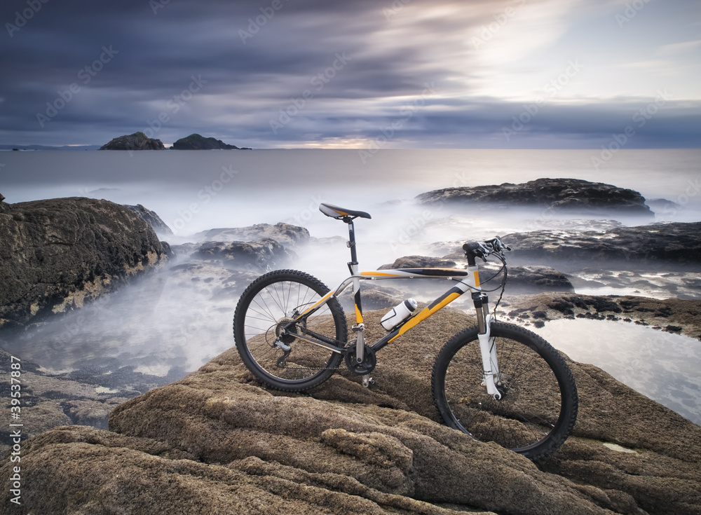 Mountain biking and rock on the sea coast