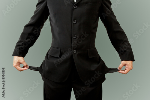 Businessman with empty pockets