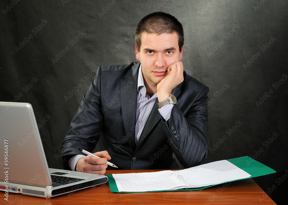 Businessman at desk. Businessman at desk.