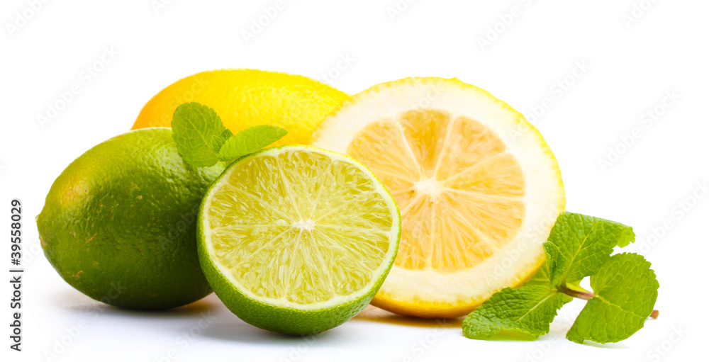 Fototapeta premium Fresh lime and lemon with mint isolated on white