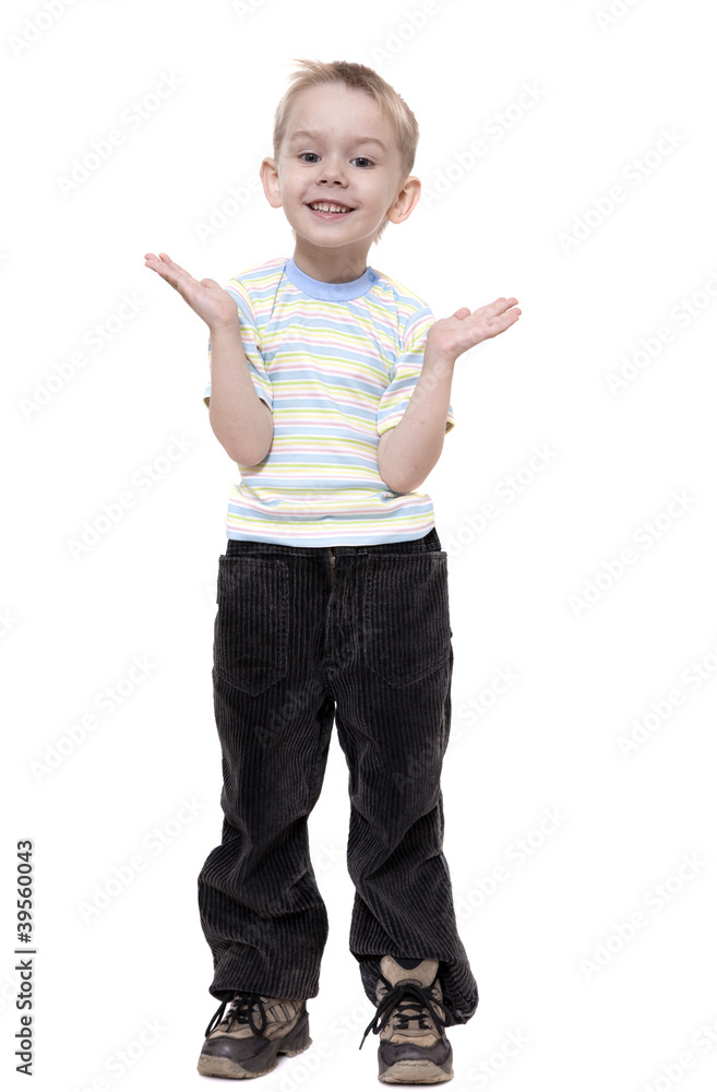 The little boy costs and joyfully slaps hands together The little boy costs and joyfully slaps hands together