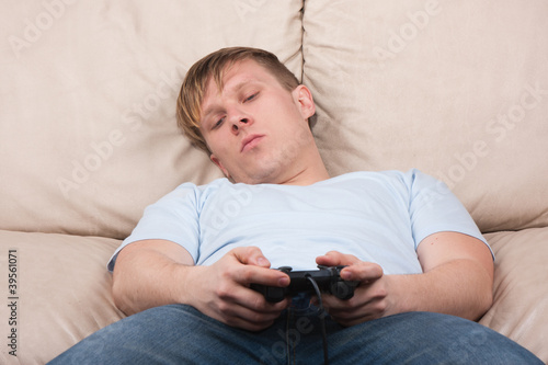 portrait of a sleepy gamer