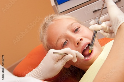 Fotografija Teenage girl at the dentist.