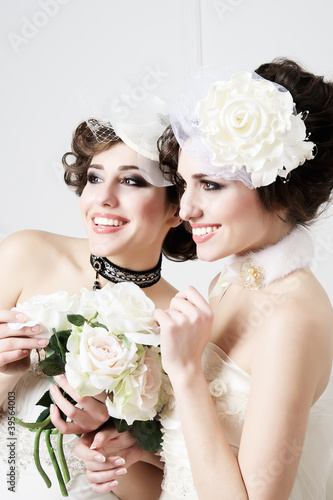 Two sisters brides having fun