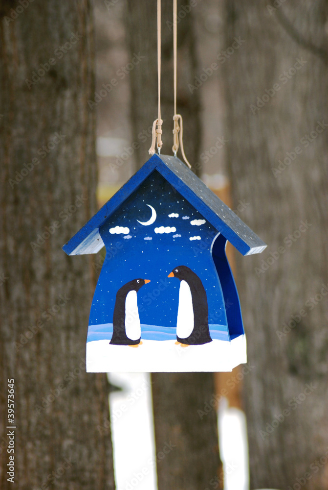 Blue birds feeder in the forest vertical Blue birds feeder in the forest vertical