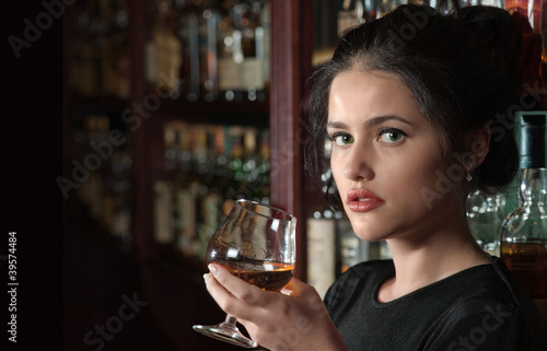 Brunette girl with a glass