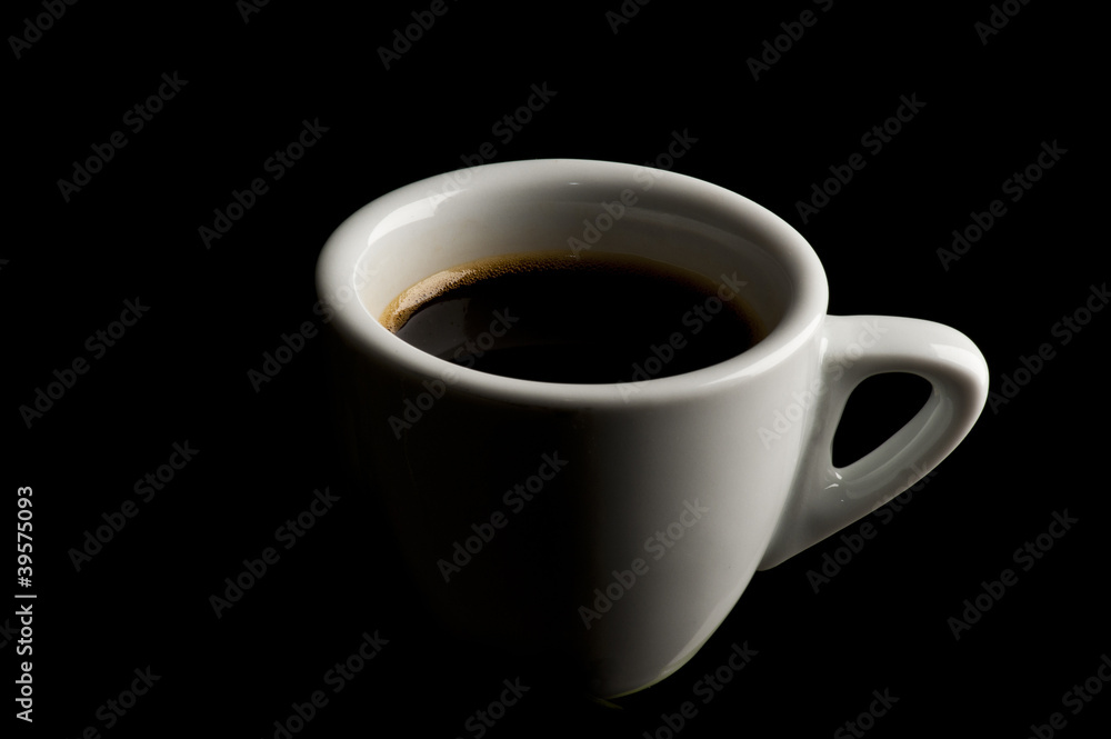cup of coffee on black background cup of coffee on black background