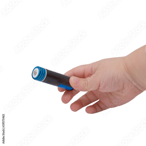 Child's hand with battery