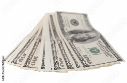 stack of one hundred dollar bills isolated on white background
