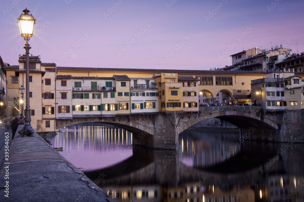 Sunset view of ponte vecchio in florence, italy