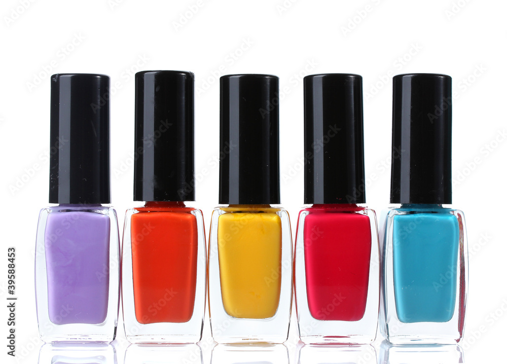 Group of bright nail polishes isolated on white Group of bright nail polishes isolated on white