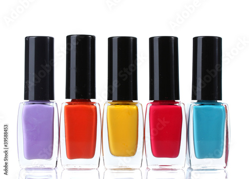Group of bright nail polishes isolated on white