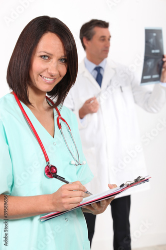 pretty nurse and doctor in hospital