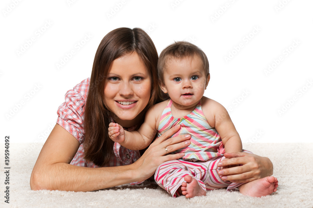Cheerful baby girl with smiling mother Cheerful baby girl with smiling mother