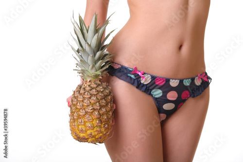 woman with pineapple isolated on white