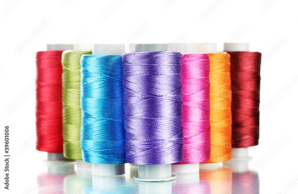 bright bobbin thread isolated on white. bright bobbin thread isolated on white.