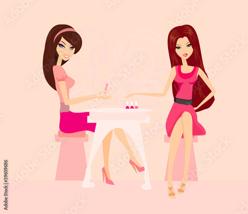 Young lady doing manicure in beauty salon