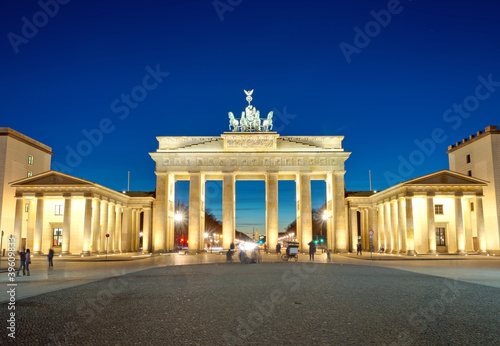 The illiminated Brandenburg Gate at dawn photo