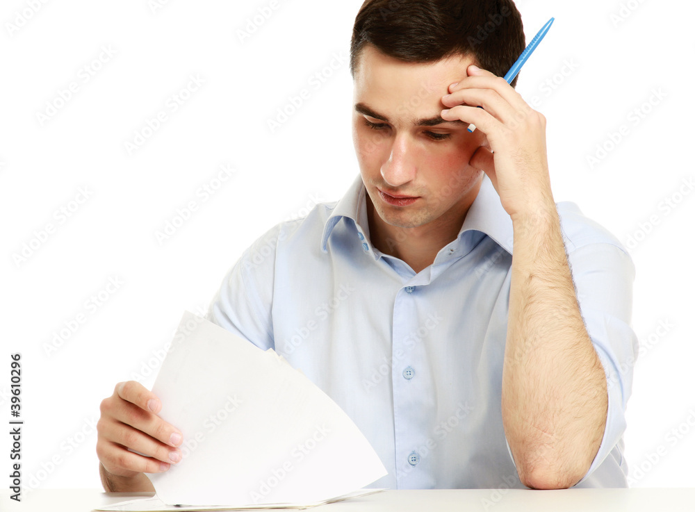 A young guy studying, isolated on white background A young guy studying, isolated on white background