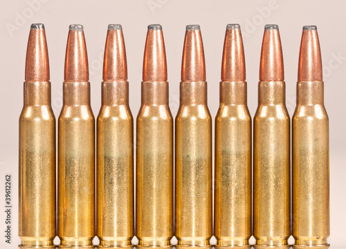 Straight row of rifle bullets