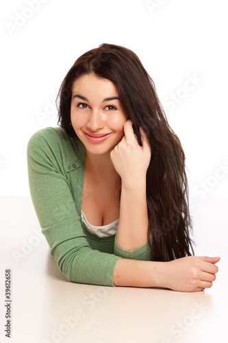 A college girl lying on the floor , isolated on white background