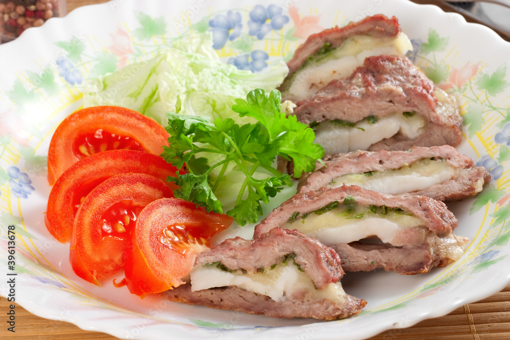 meat filled with bacon and cheese, tomatoes, parsley meat filled with bacon and cheese, tomatoes, parsley