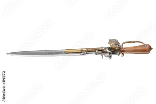 old fashioned dagger that has a pistol mounted on the blade photo