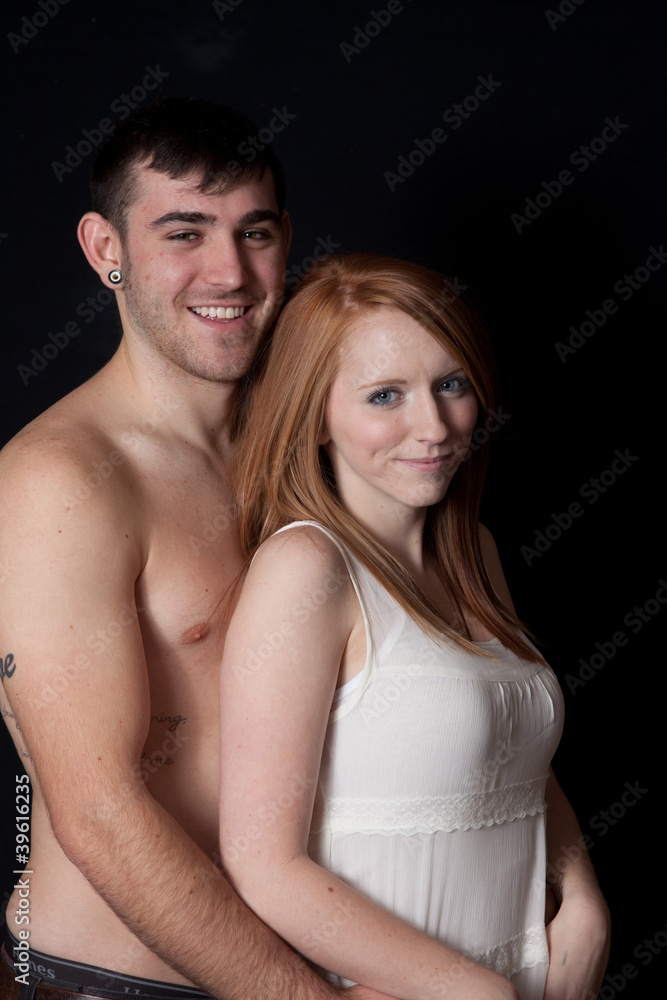 Romantic couple touching and smiling Romantic couple touching and smiling