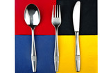 Fork spoon and knife  on colors background