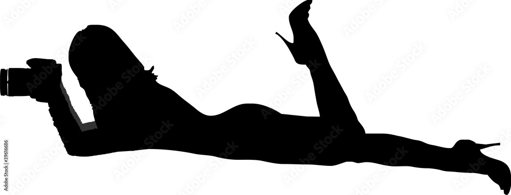 silhouette of a sexy girl lying flat and taking pictures silhouette of a sexy girl lying flat and taking pictures