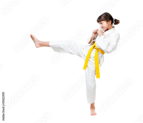 little girl in a kimono with a yellow sash