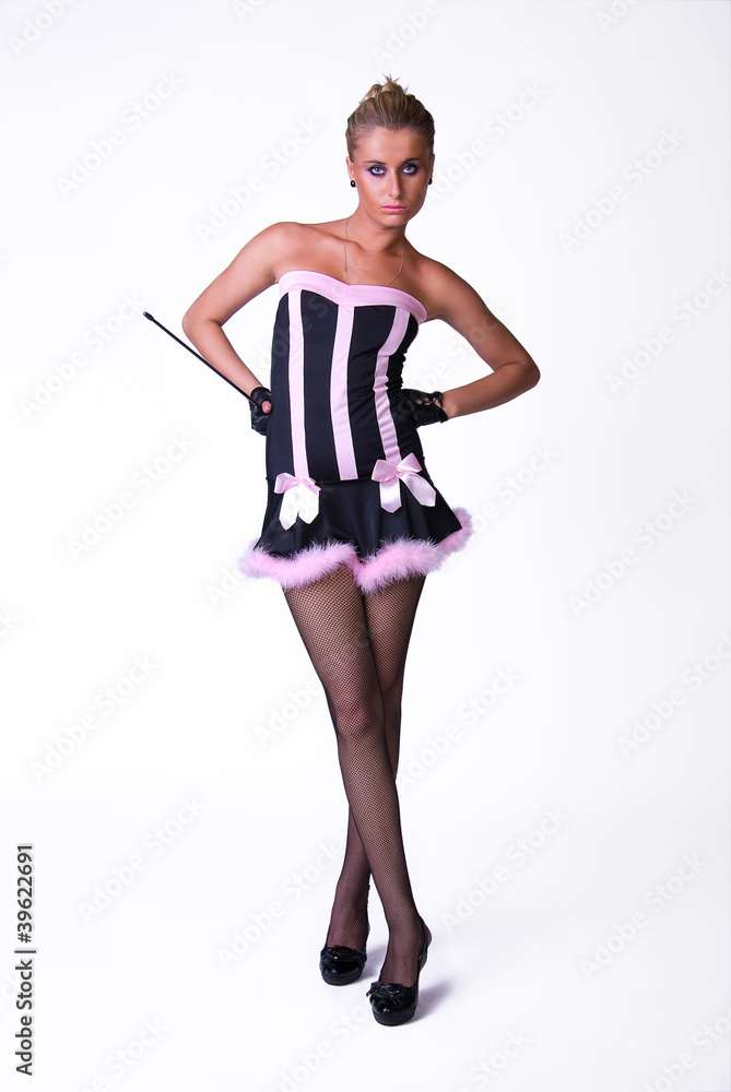 Female model posing in blak and pink dress Female model posing in blak and pink dress