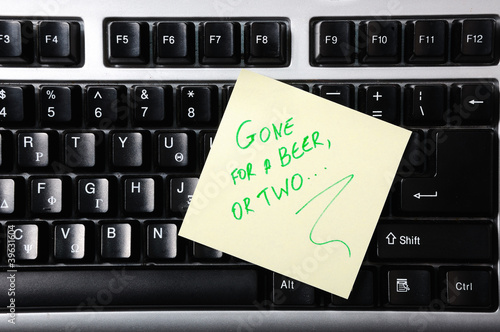 Adhesive Note on keyboard-Gone for a beer or two