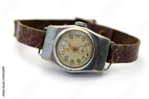 The old watch on white background close-up