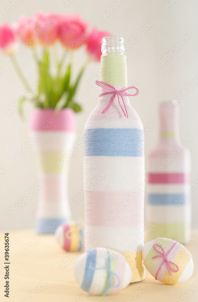 Pink tulips, Easter eggs and yarn wrapped bottle Pink tulips, Easter eggs and yarn wrapped bottle