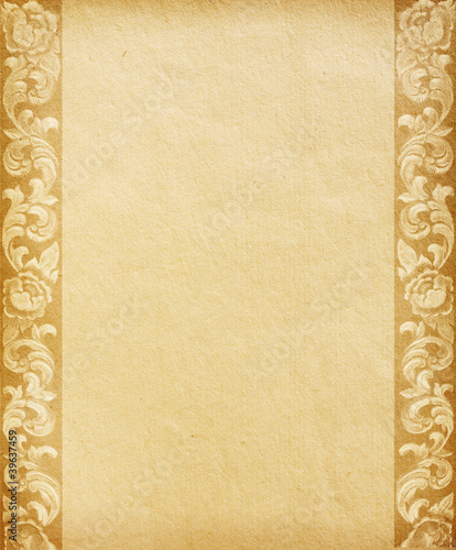 Old worn paper with floral ornament