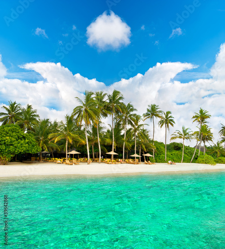 tropical island beach with blue sky