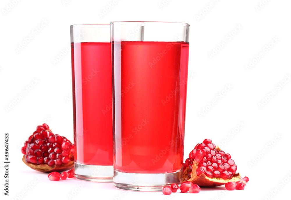ripe pomergranate and glasses of juice isolated on white. ripe pomergranate and glasses of juice isolated on white.