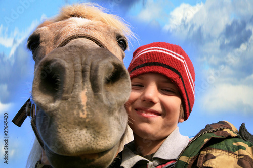 Boy and horse © fotokate