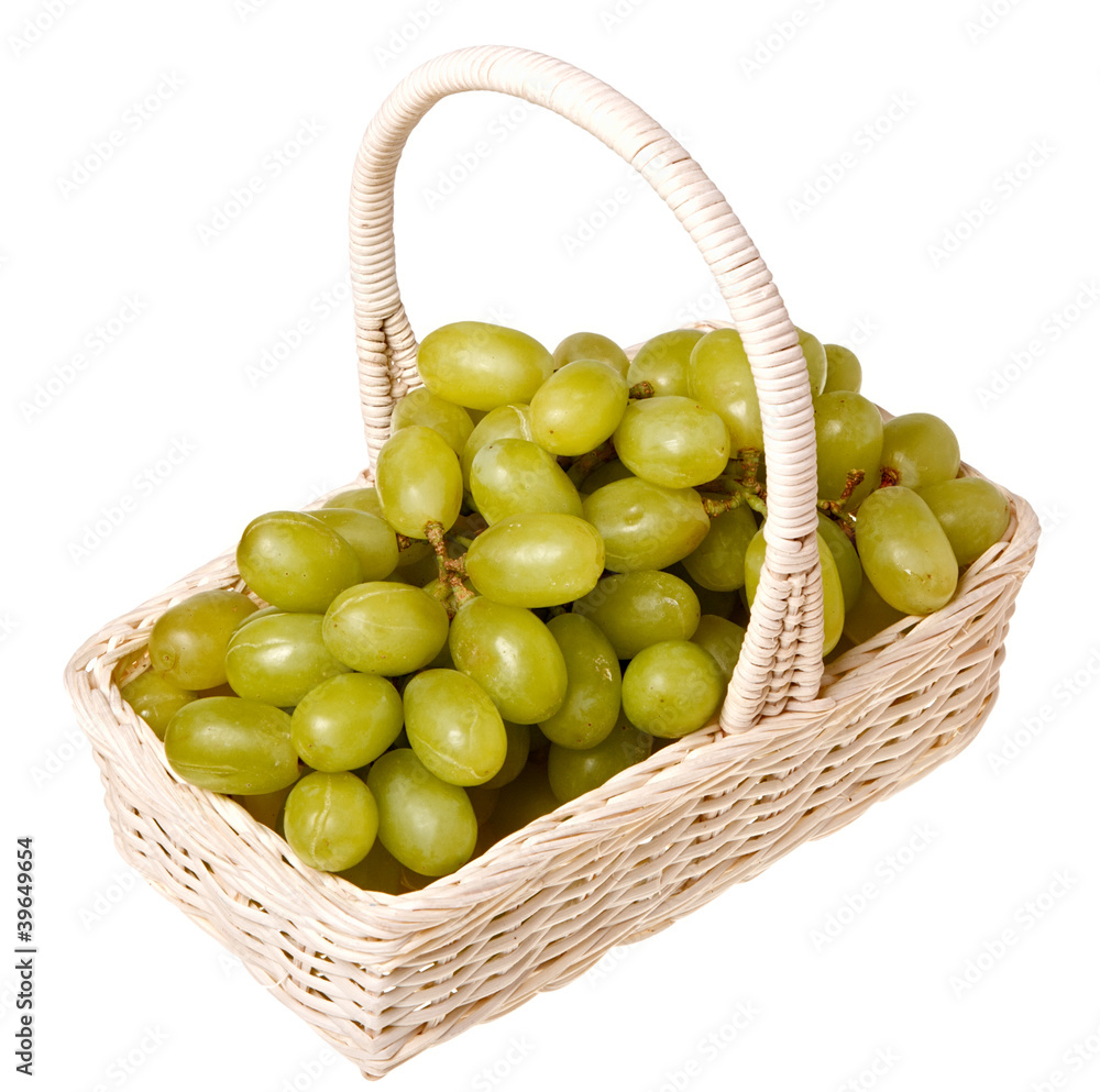 Fresh grapes in a basket isolated on white background. Fresh grapes in a basket isolated on white background.