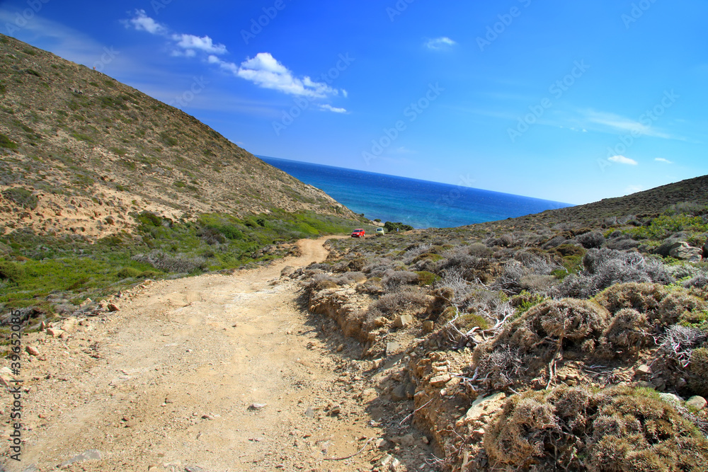 dirt road on a mountain slope. Greece. Rhodes..