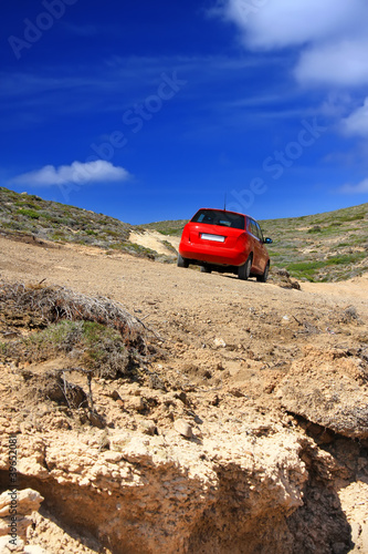 The car on a dirt road on a mountain slope. Greece. Rhodes.. © Konstantin Kulikov