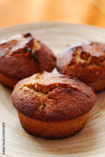 Homemade muffins with hazelnuts, orange peel and raisins