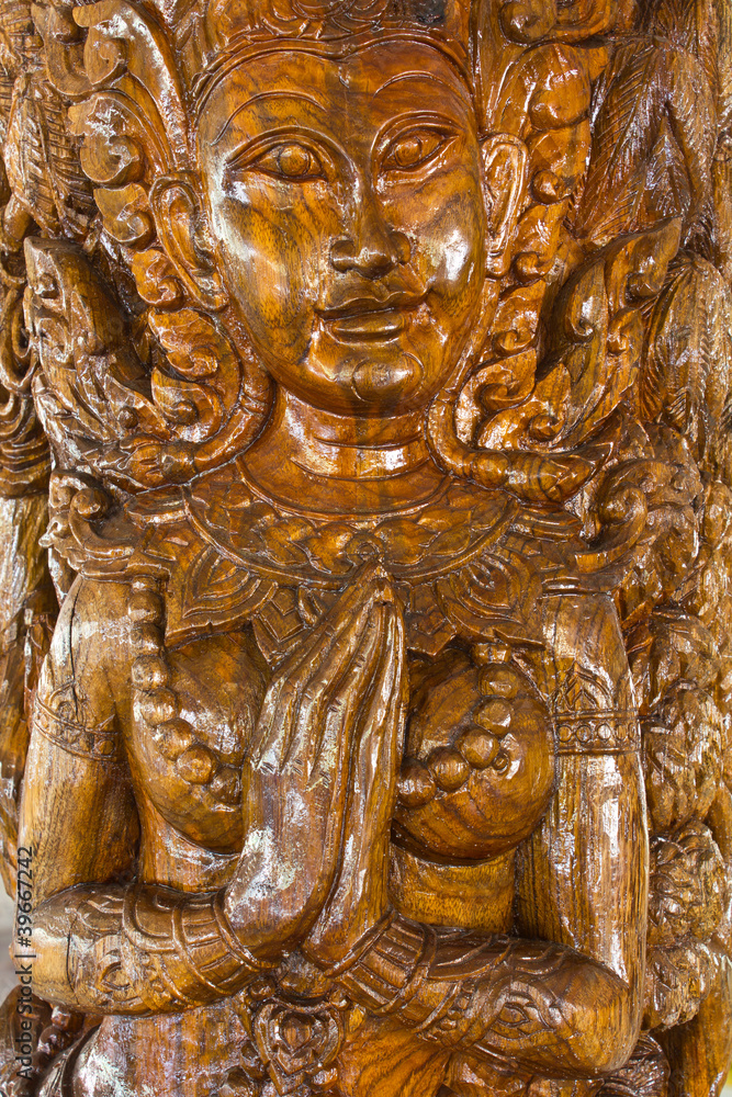 Fototapeta premium Teak-wood carving is a form of literature.