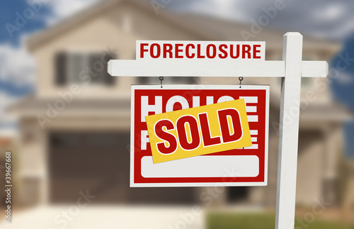 Sold Foreclosure Home For Sale Sign and House