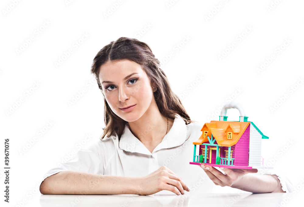 beautiful girl with the layout of a country house beautiful girl with the layout of a country house