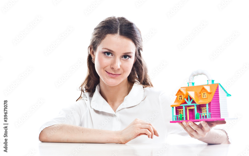 beautiful girl with the layout of a country house beautiful girl with the layout of a country house
